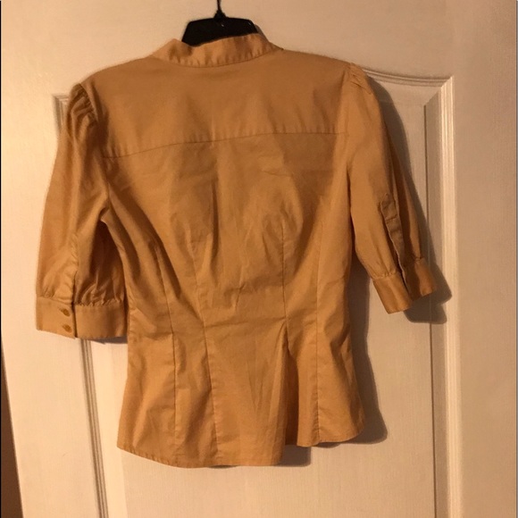 Ruffle front button up shirt from Bebe is size S. - Picture 3 of 3